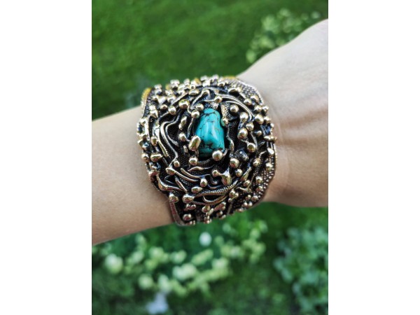 Turquoise accent in bronze