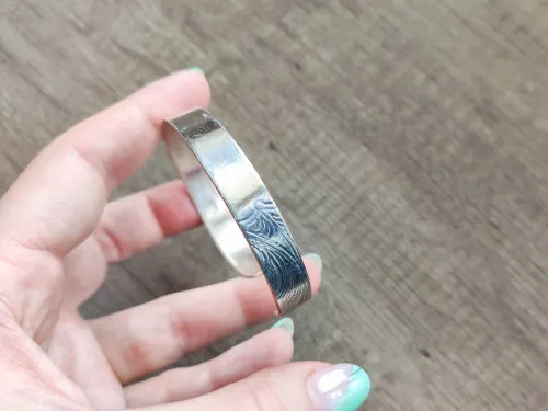 Plain with a soft pattern in silver-plated copper