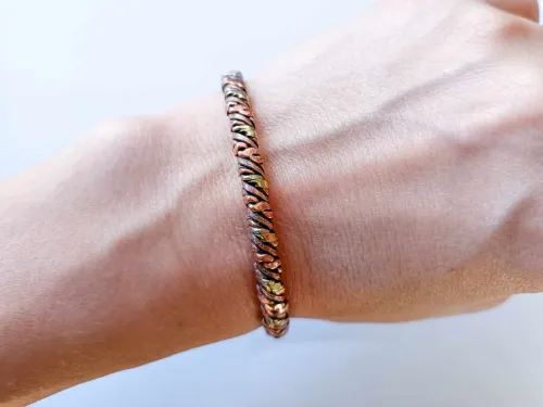 Braided copper bracelet with brass thread (wider)