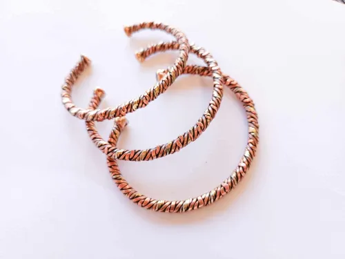 Braided copper bracelet with brass thread (wider)