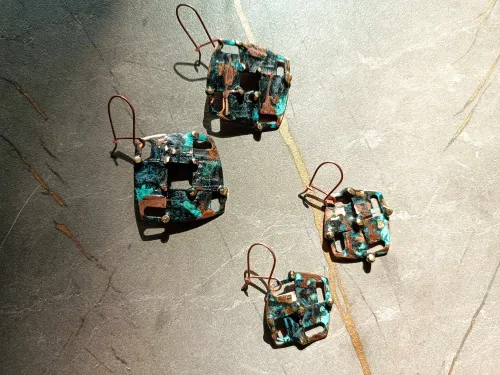 Aged copper crosses