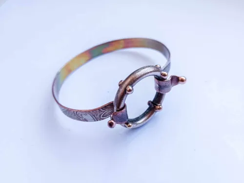 Silver-plated copper bracelet with a removable round ring