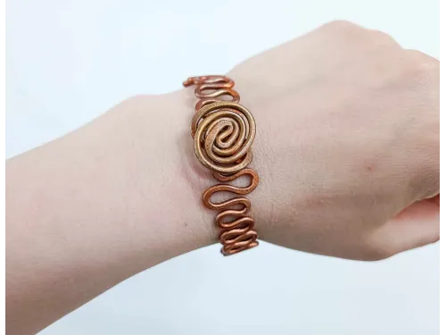 Twisted copper bracelets with a wave and circle of life in the center no. 1