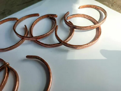 Copper carvings 0.5 cm wide (thickness 0.3 cm)