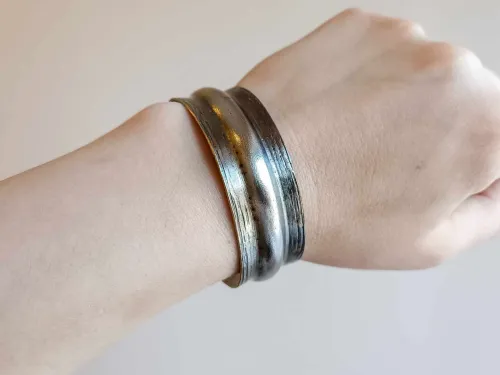 Wider and narrower brass bracelet