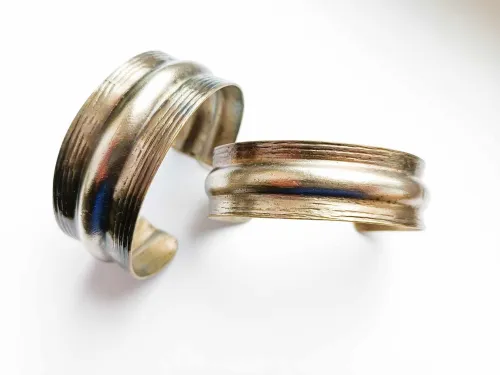 Wider and narrower brass bracelet