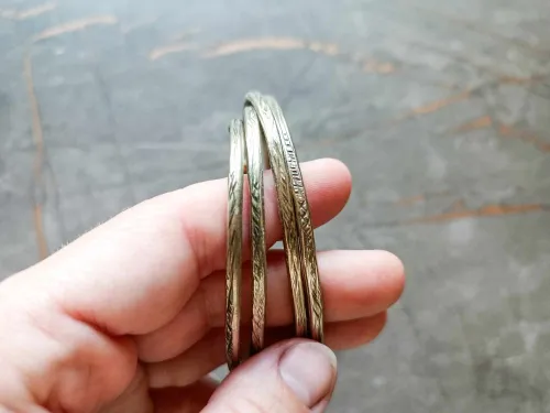 Melchior bracelets with carved design