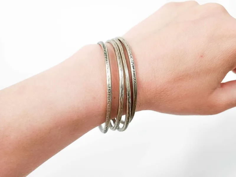 Melchior bracelets with carved design