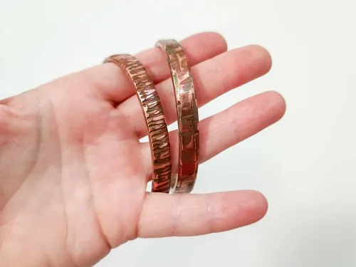 Copper bracelet with bright textures 0.8 cm wide