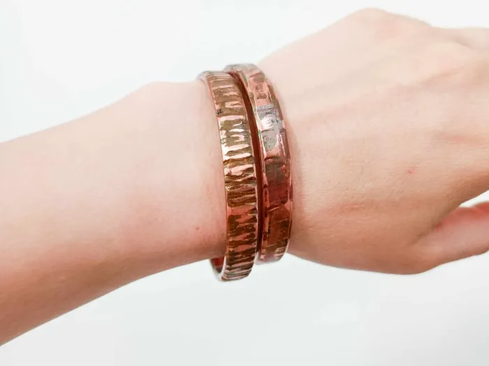Copper bracelet with bright textures 0.8 cm wide