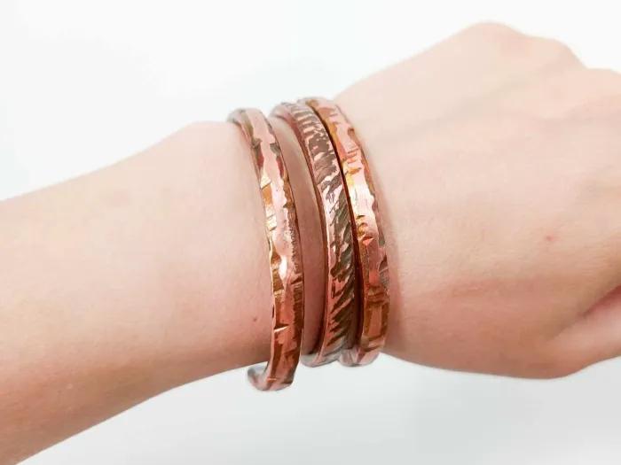 Copper bracelet with bright textures, 0.5 cm wide